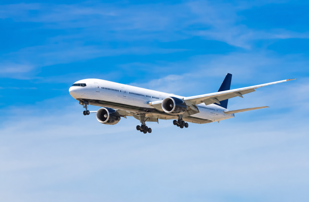 Unbranded passenger airplane in flight